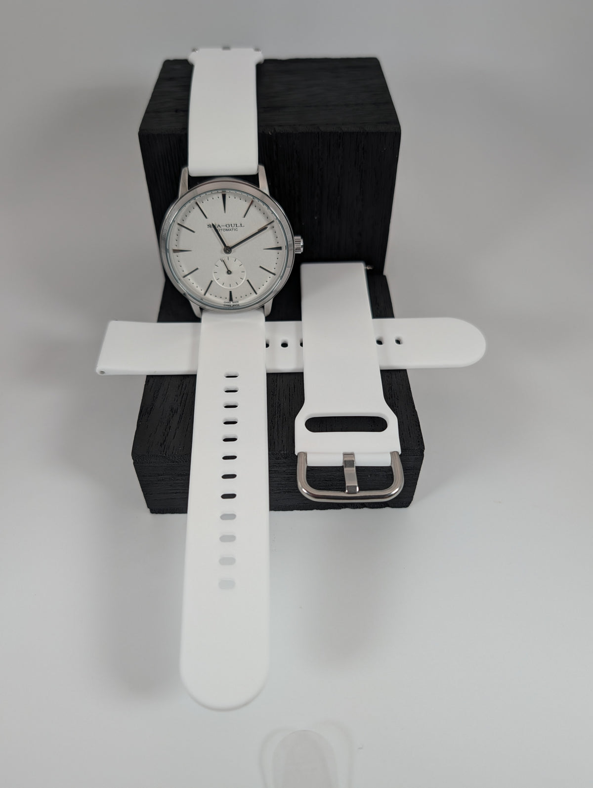 White silicone strap fitted on a watch (watch not included)